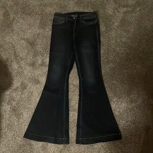 Worn once bell bottom jeans. High waisted. Dark blue wash